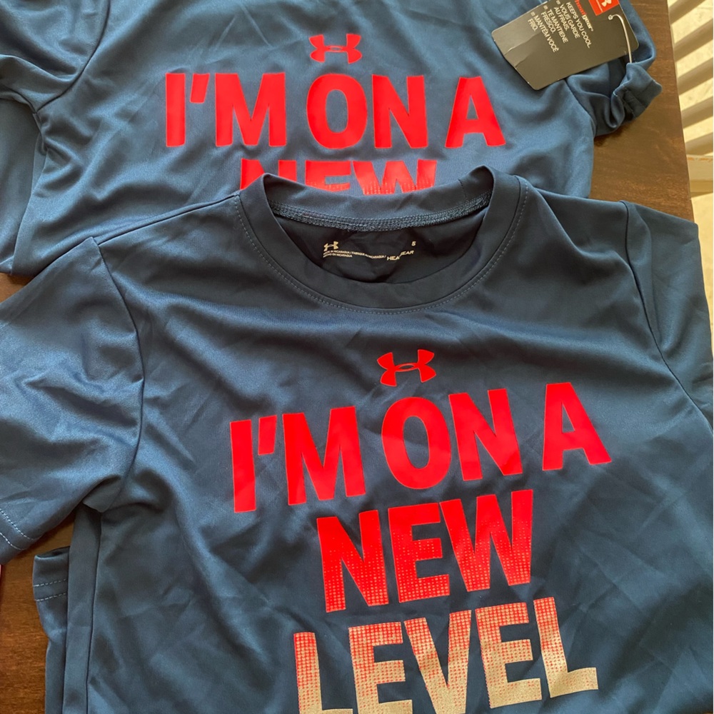 2 new shirts one sz 4 one sz 5